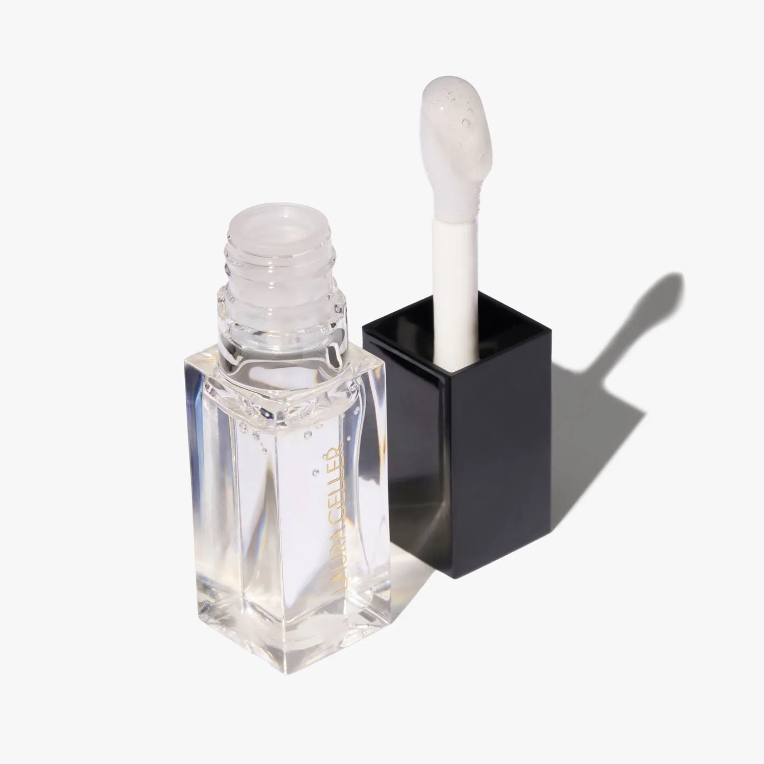 LG_Fine_Shine_Glossy_Lip_Oil_PDP_Glass_Half_Full_Fenty-ECommerce_JPG.webp
